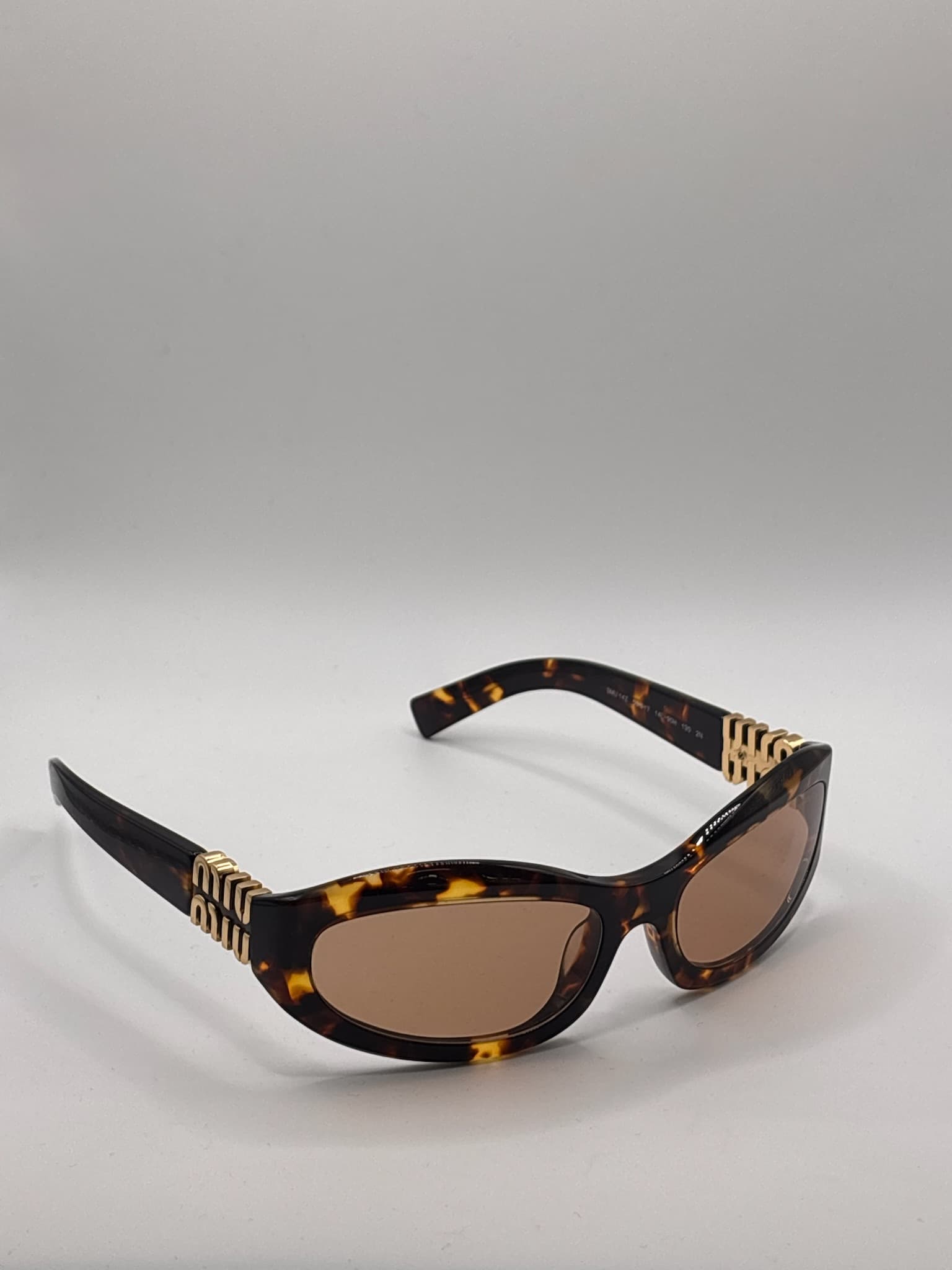 Miu Miu SMU 14Z 59017 14L-90H - image 4