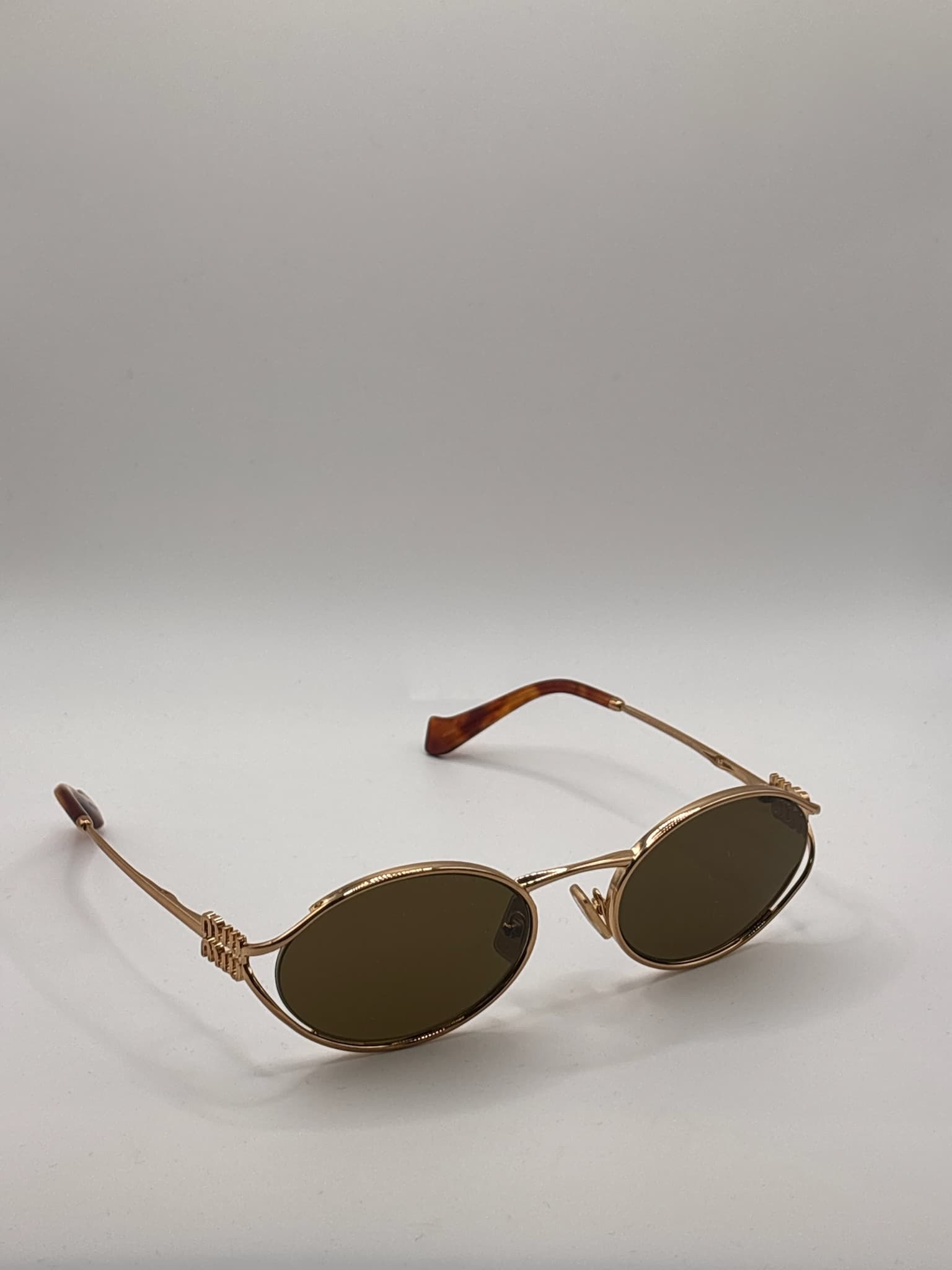 Miu Miu SMU 52Y 54021 70E-01T 129 OIS - image 4